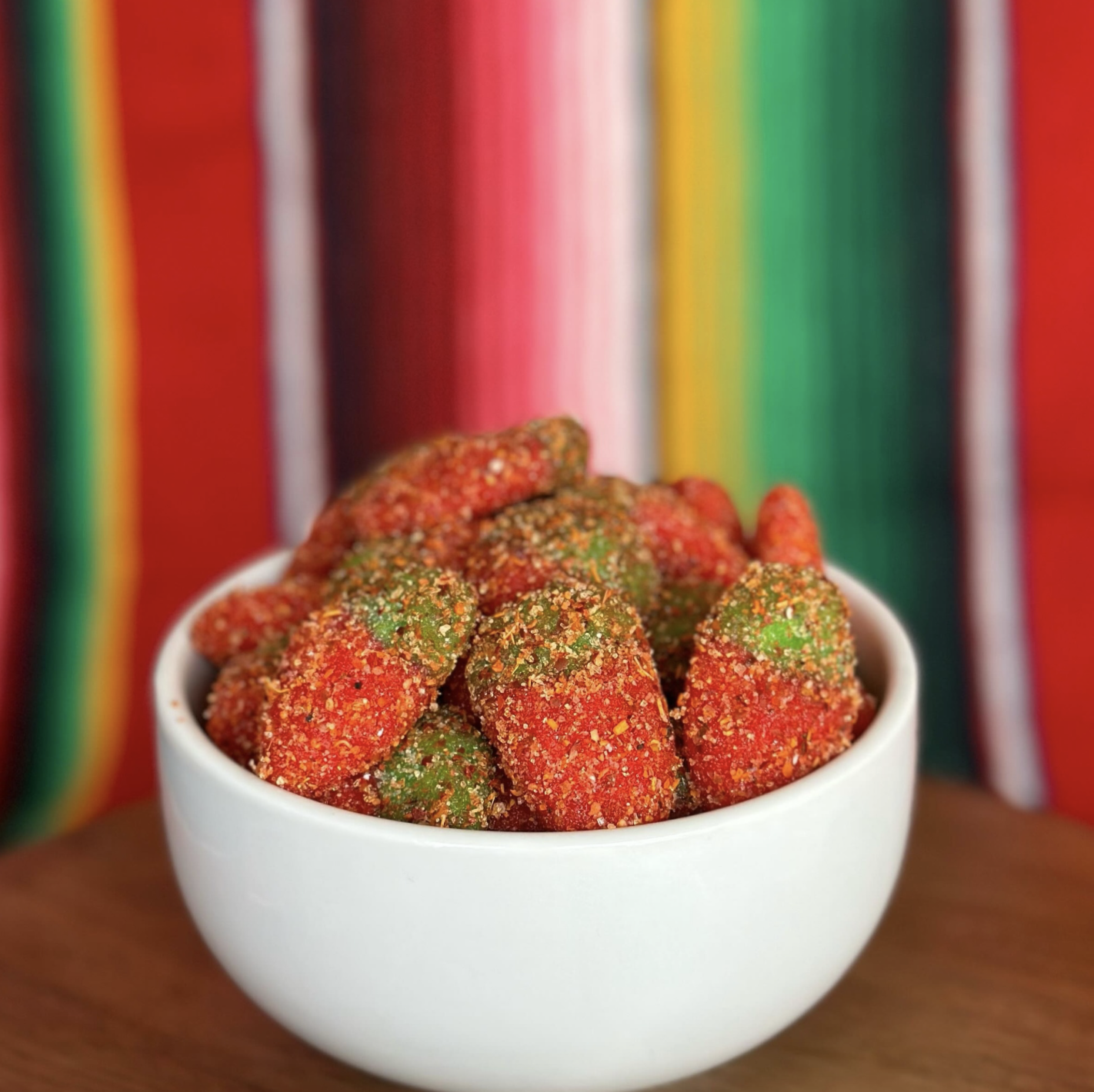 Strawberry-shaped gummy candies with a spicy-sweet finish